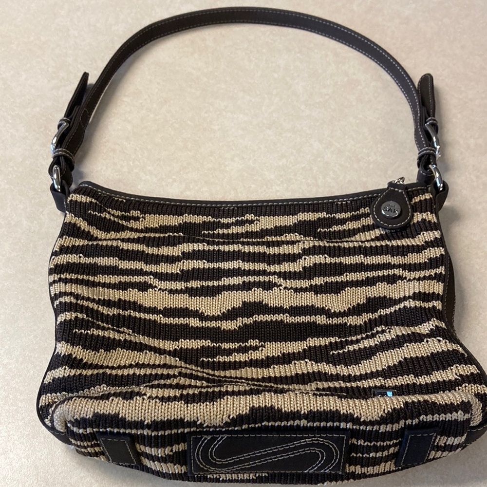Brown and tan purse.
